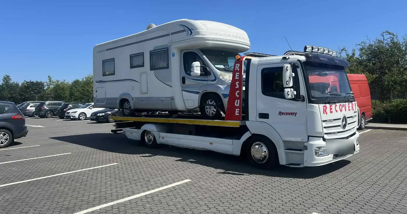 A motorhome loaded on one of our recovery trucks